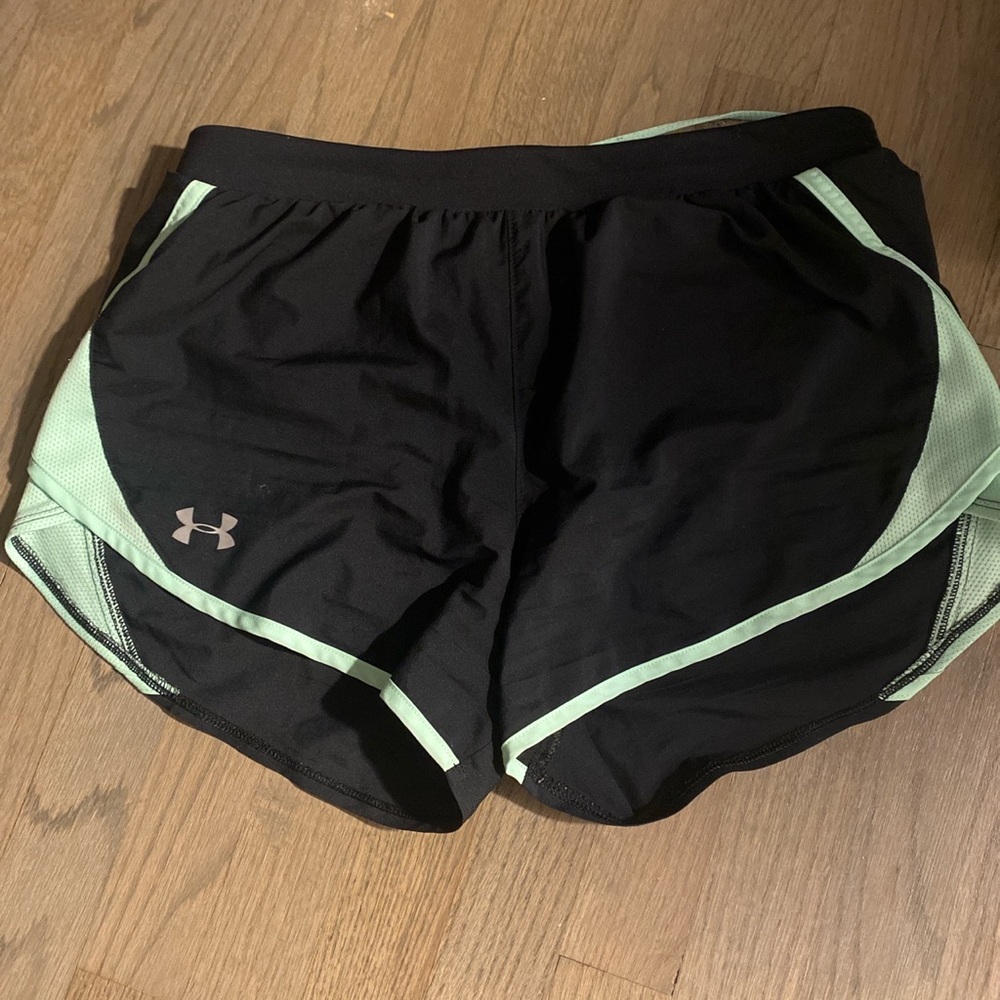 Green athletic shorts under armor